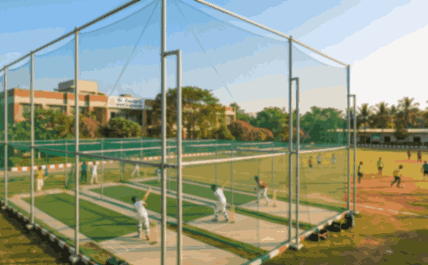 Cricket practice nets with safety netting at a sports ground