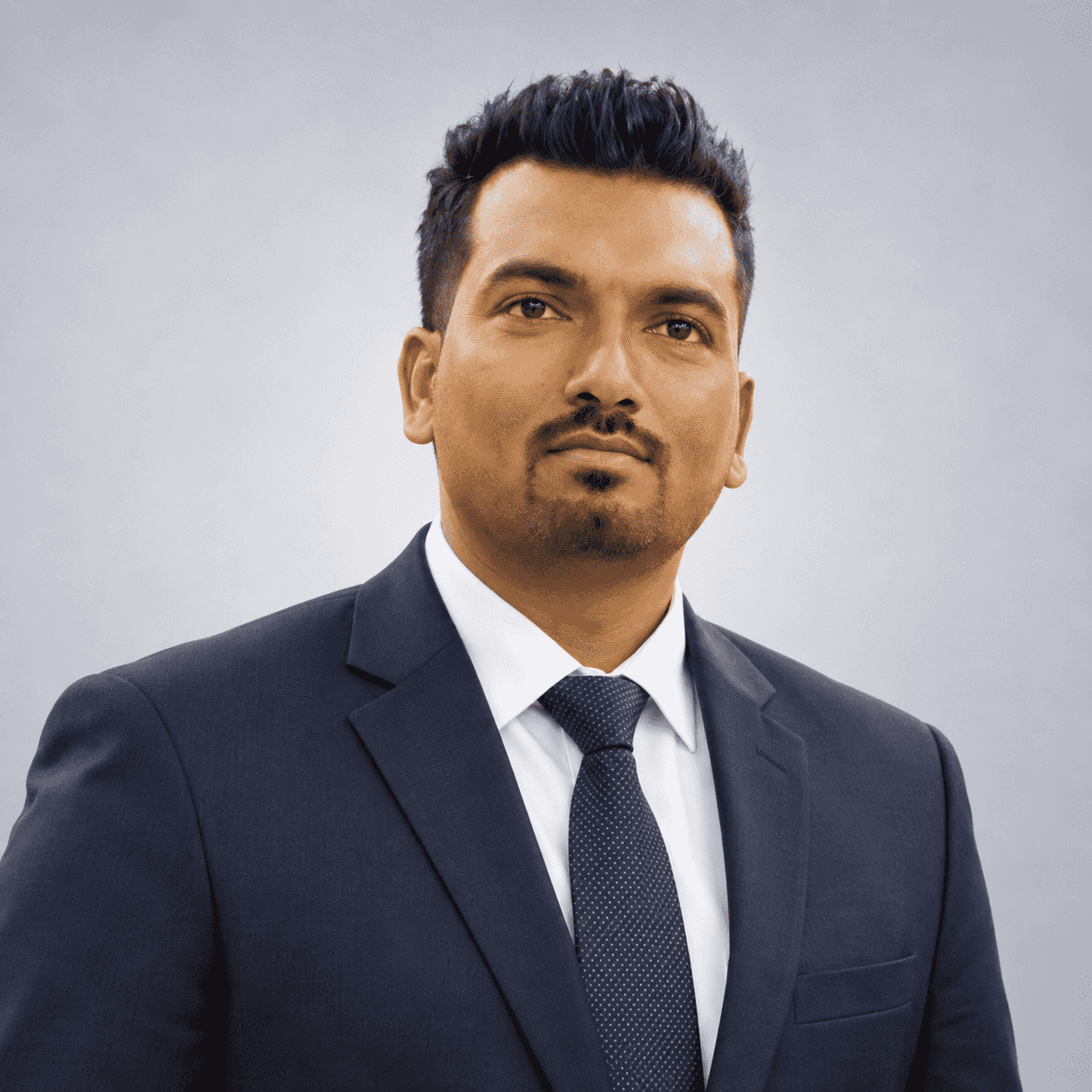 Sidharth Gaikwad, Managing Director of SSD Pest Control Services Pvt. Ltd., in a navy suit and tie